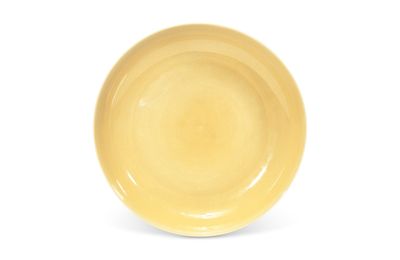 A yellow-glazed dish, Hongzhi six-character mark in underglaze blue within a double circle and of the period 