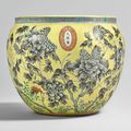 A yellow-ground grisaille-enameled fish bowl, Qing dynasty, Dayazhai mark, Guangxu period (1875-1908)