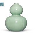 A fine celadon-glazed double-gourd form lobed vase, Yongzheng six-character seal mark in underglaze blue and of the period