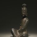 A fine cast bronze seated figure of Guanyin, 17th century
