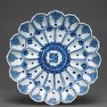 A blue and white moulded 'Lotus' dish, Wanli six-character mark and of the period (1573-1619)