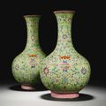 A pair of lime-green ground famille-rose vases, Jiaqing seal marks and period
