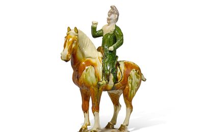 A sancai-glazed figure of an equestrian, Tang dynasty