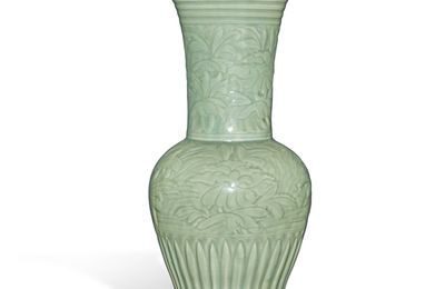 An extremely rare dated and carved 'Longquan' celadon-glazed 'peony' vase, Dated Yongle 15th year, corresponding to 1417