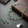 A Jadeite and Diamond Necklace and Earring Suite