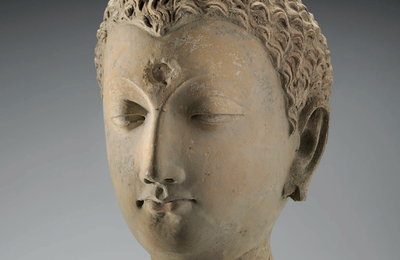 A life-size stucco head of Buddha, Gandhara, 3rd-4th century