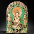 A rare and large sancai-glazed architectural fitting of Guanyin in a grotto, Ming Dynasty
