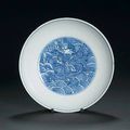 A blue and white saucer dish - Qianlong seal mark and of the period