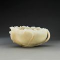  A fine carved white jade “lotus leaf” brush washer, "Bixi", early Qing Dynasty, 17th -18th century