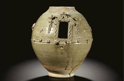 A rare inscribed and dated 'Fujian' green-glazed stoneware funerary jar, dated Jiajing 44th year (AD 1565) 