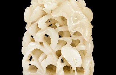 A white jade reticulated 'lotus and egrets' finial, Ming dynasty (1368-1644)