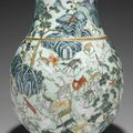 A large famille rose molded 'Hundred-deer' vase, hu, Qing dynasty (1644-1911)