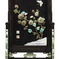 An inlaid carved porcelain and soapstone zitan revolving screen with imperial poems, seal marks and period of Qianlong 