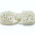 A white jade 'dragon' belt buckle, Qing dynasty, 18th century