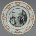 Chine de commande. Assiette ronde peinte en grisaille d'une scène représentant "Les oies du Frère Philippe", XVIIIème siècle