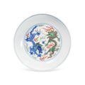 A combined wucai  and doucai 'dragon' dish, Kangxi mark and period (1662-1722)