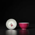 A fine and extremely rare pair of ruby-pink and famille-rose 'lychee' cups, Marks and period of Yongzheng
