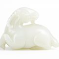 A white jade recumbent ram, Qing dynasty, 18th century