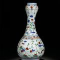 A rare 'wucai' 'garlic-mouth' vase, mark and period of Wanli (1573-1619)