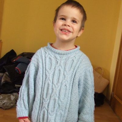 Pull torsadé couleur ciel