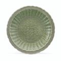 A carved Longquan celadon bracket-lobed dish, Ming dynasty, 14th-15th century