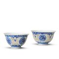 A rare pair of blue and white reticulated cups, Wanli six-character marks and of the period (1573-1619)