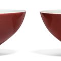 A pair of copper-red glazed bowls, Qianlong six-character seal marks in underglaze blue and of the period (1736-1795)
