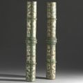 A rare Pair of rare silver-inlaid archaic bronze canopy pole fittings, Warring States Period (475-221 BC)