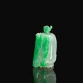An emerald green jadeite snuff bottle & a large pale icy green jadeite snuff bottle, 19th Century