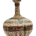 A lustre and turquoise glazed pottery bottle, Kashan, Central Iran, circa 1200