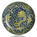 A blue-ground yellow dragon porcelain dish, China, Qianlong seal mark and of the period