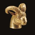 A fine pre-Achaemenid gold ibex head protome, circa 7th century B.C.