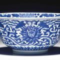 A blue and white 'lotus' bowl, Kangxi six-character mark in underglaze blue within a double circle and of the period (1662-1722)