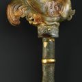 An archaistic jade bird pole finial with bronze fitting, Song dynasty