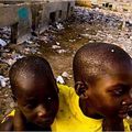 In a Senegalese Slum, a Building Material Both Primitive and Perilous