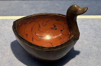 Duck-shaped lacquered spoon with painted decorations and silver-edge trim, Han dynasty (206 BC-220 AD)