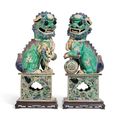 A pair of famille verte biscuit-glazed Buddhist lions, Kangxi peiod (1662-1722)
