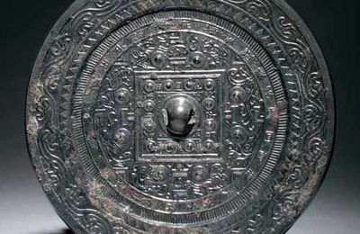 Bronze mirror of TLV type. China, Xin dynasty (9–23) 