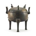 A bronze tripod incense burner and cover, Ming Dynasty (1368-1644)