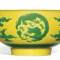 A yellow-ground green-enamelled ‘dragon medallion’ bowl, mark and period of Yongzheng (1723-1735)