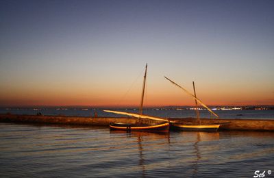 Des voiles au couchant