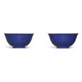 A fine and superb pair of blue-glazed bowls, Qianlong seal marks and period (1736-1795)