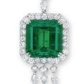 An emerald and diamond pendant 