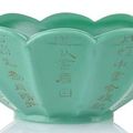 A fine lobed turquoise glass chrysanthemum bowl decorated with incised lines of verse, Qianlong four-character seal mark and of 