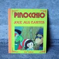 LIVRE PINOCCHIO JOUE AUX CARTES 1985