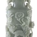 A fine openwork and relief carved jade vase with cover. China, 18th-19th century. 