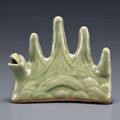 A Longquan celadon mountain-form brush rest and water dropper, Ming dynasty (1368-1644)