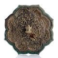 An extremely rare and superb 8-lobed bronze mirror with inset part-gilt repoussé silver sheet. Tang dynasty