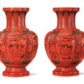 A very rare pair of Imperial carved three-colour lacquer vases, Qianlong period (1736-1795)