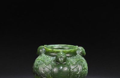 A rare spinach-green jade 'heavenly bird' jar, zun, Qianlong-Jiaqing period (1736-1820)